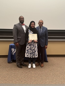 Najla Khan&nbsp;displays the Assistant Dean's Special Recognition Award
