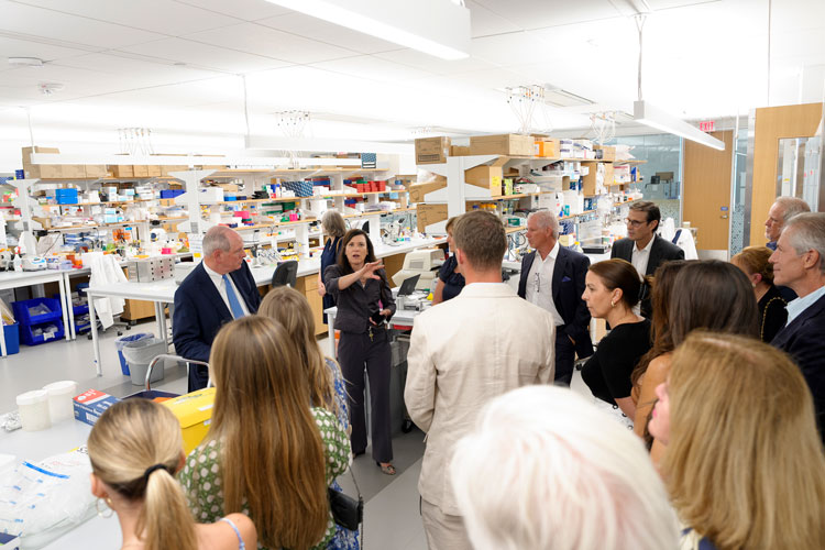 Daryl A Bosco providing a tour of the Bosco Lab during the DiMare naming celebration event
