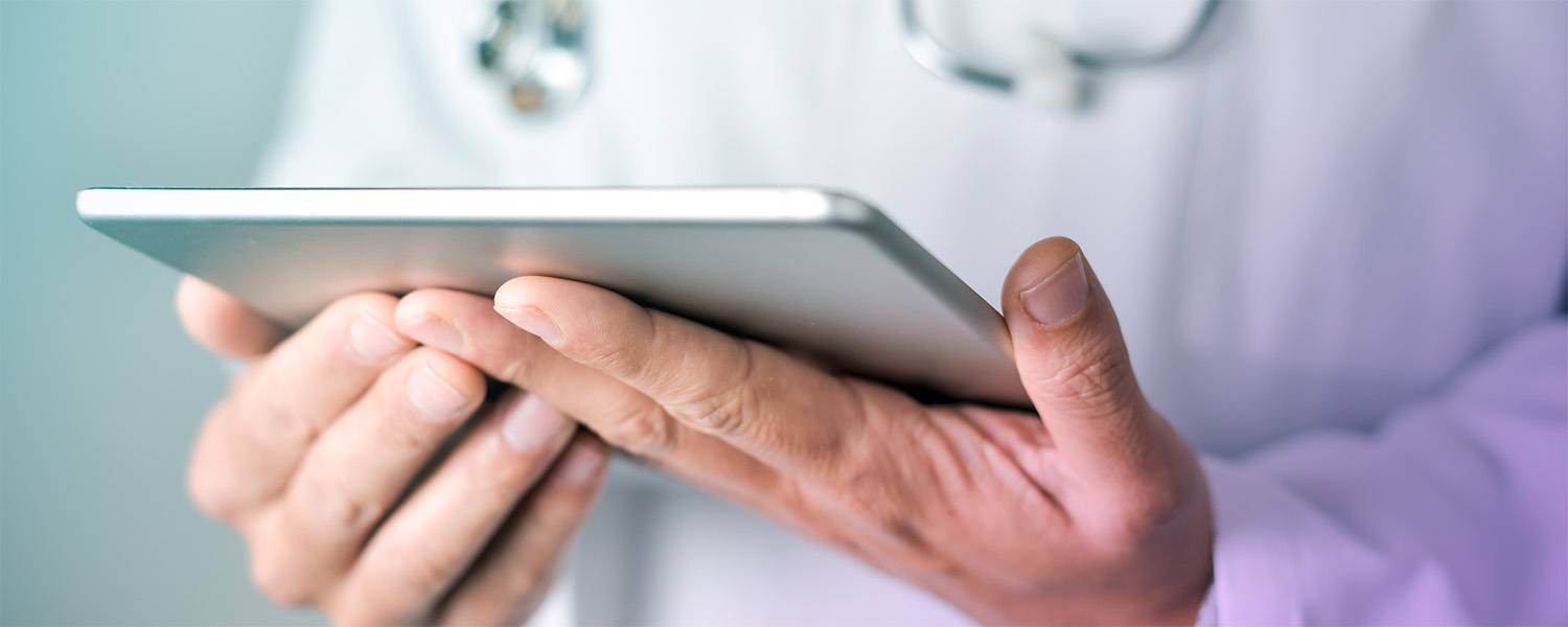 Doctor holding tablet