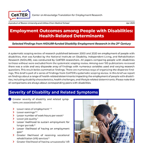 male sitting on the couch blowing his nose