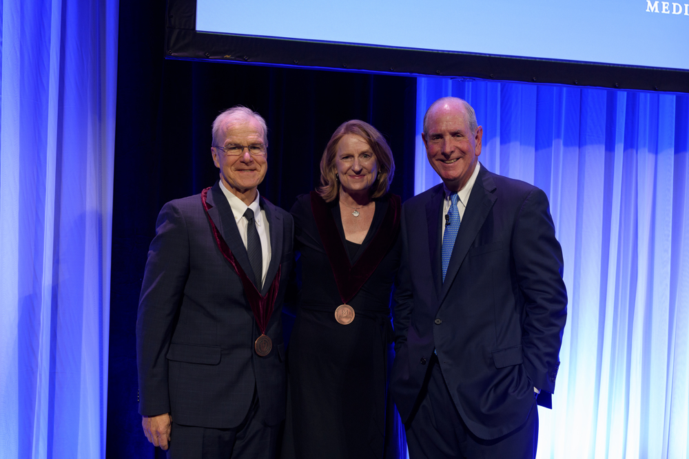 Dean Flotte and Chancellor Collins with the newly invested Jeannette Wolfe. Photo: John Gillooly/PEI