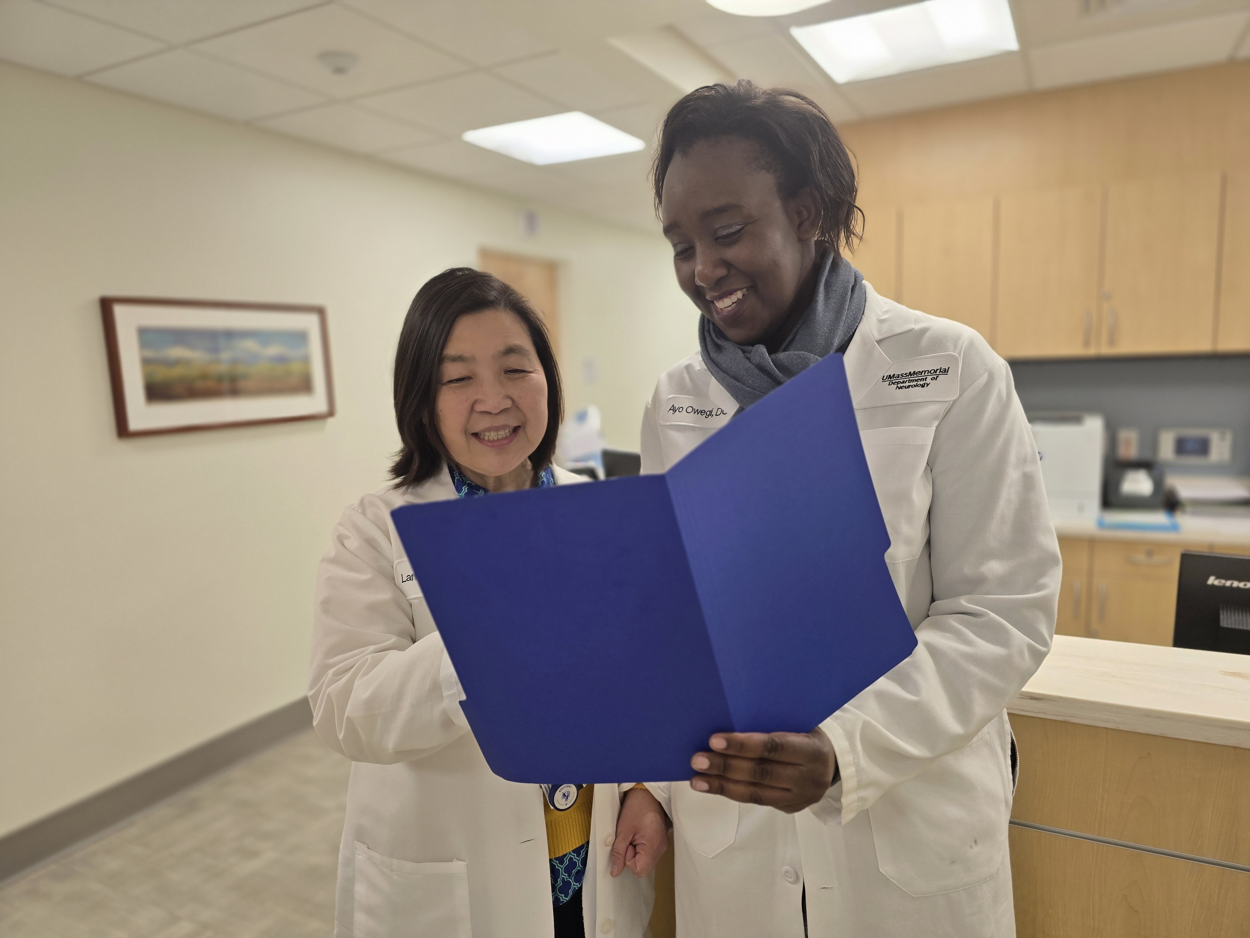 Neuromuscular Medicine physicians conferring on patient treatment care