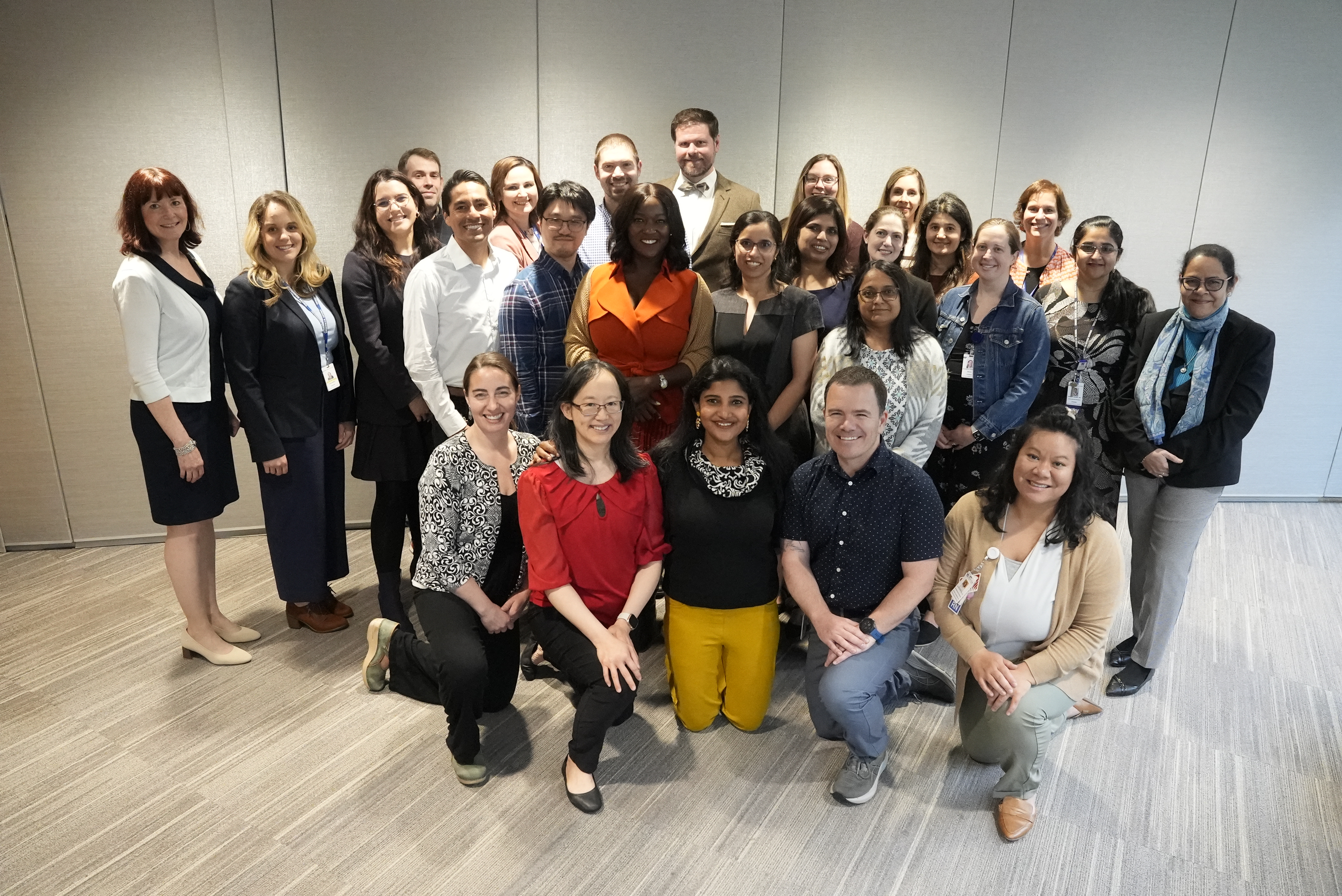 26 individuals from JFDP AY25 cohort smiling