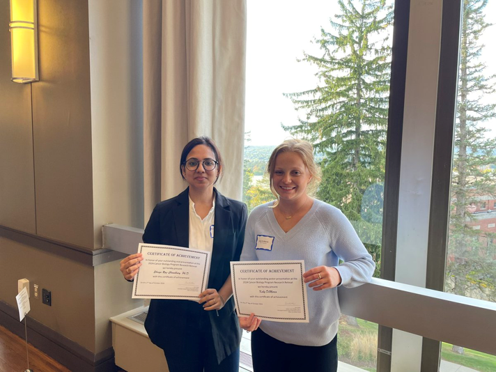  Kelly with award 10-25.png