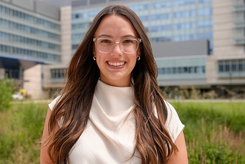Olivia Raymond outside wearing a white shirt