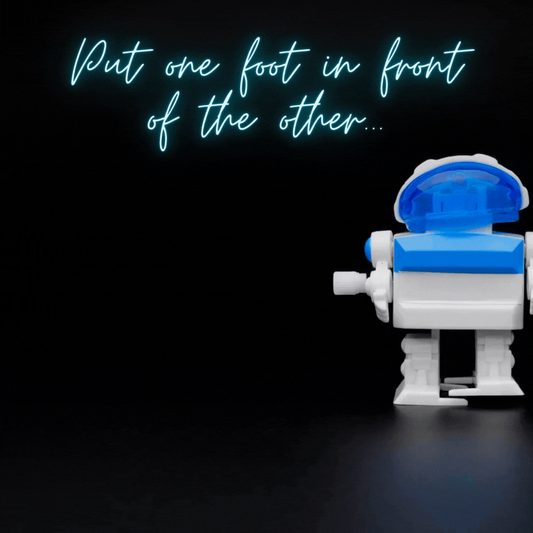 wind up toy robot walking across the table