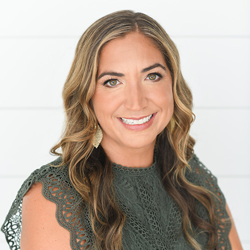 white woman with long blonde wavy hair