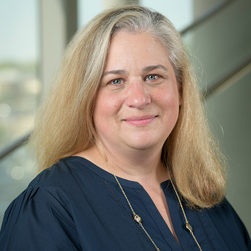 white woman with grey blonde hair