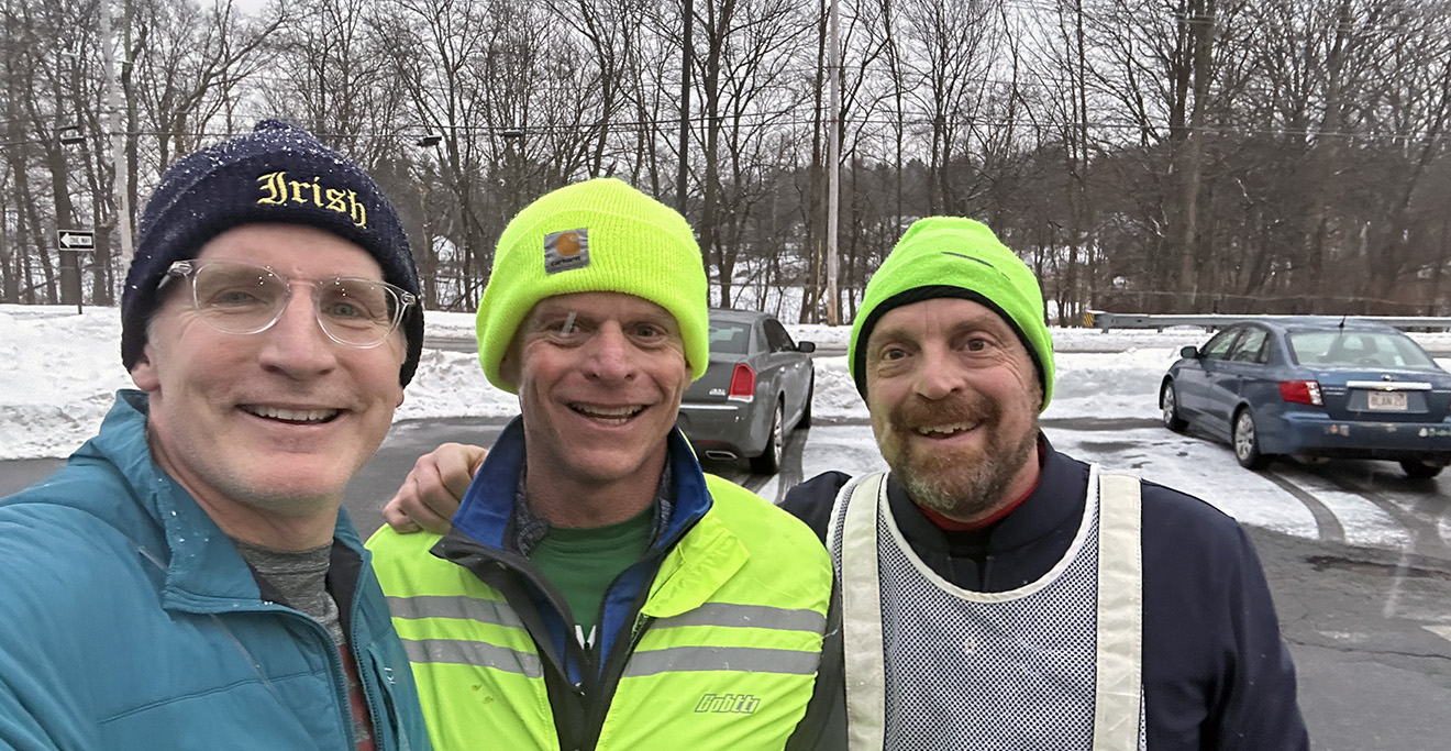 Photo of John Kelly (middle) with some running friends