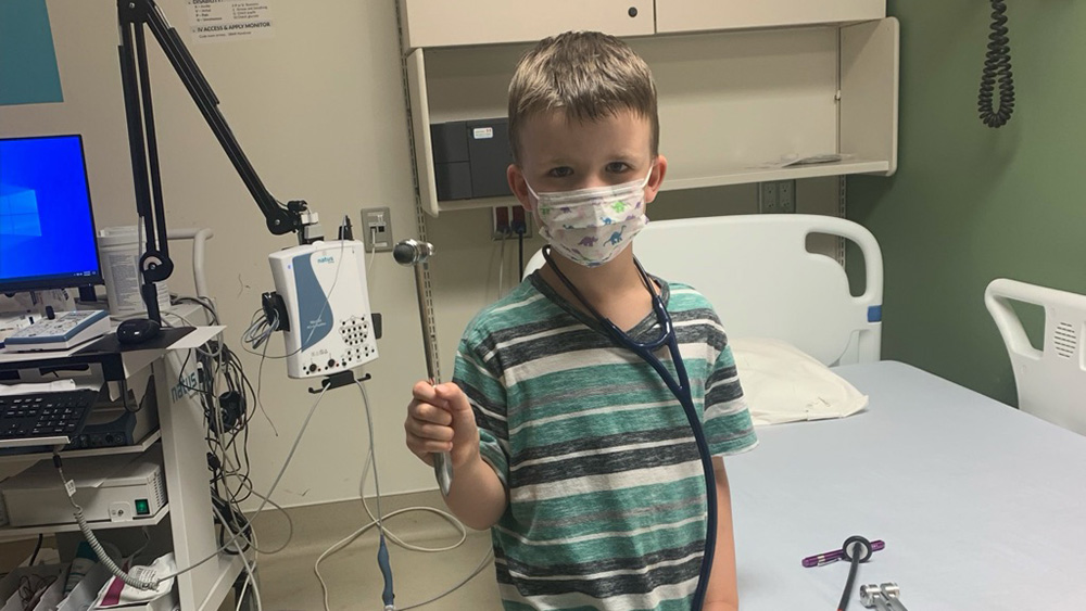 Jack wears a mask during a doctor&rsquo;s visit