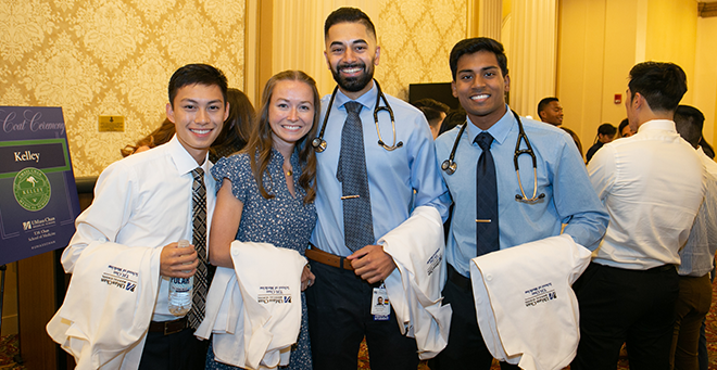 T.H. Chan School of Medicine Class of 2026 students don white coats at first-year ceremony